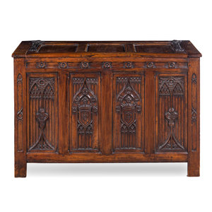 Appraisal: A Gothic Style Carved Walnut Chest Incorporating th Century Elements