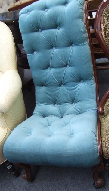 Appraisal: A th century mahogany framed button scroll back nursing chair