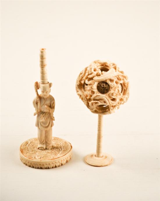 Appraisal: Two Carved Ivory Items a ball within a ball within