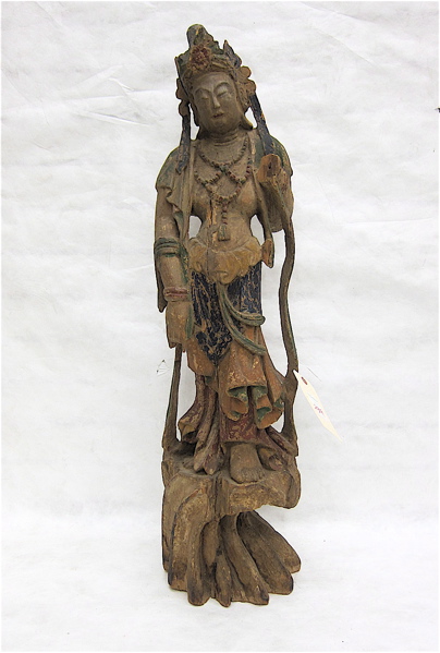 Appraisal: CARVED WOOD FIGURE OF GUANYIN Chinese th century the standing