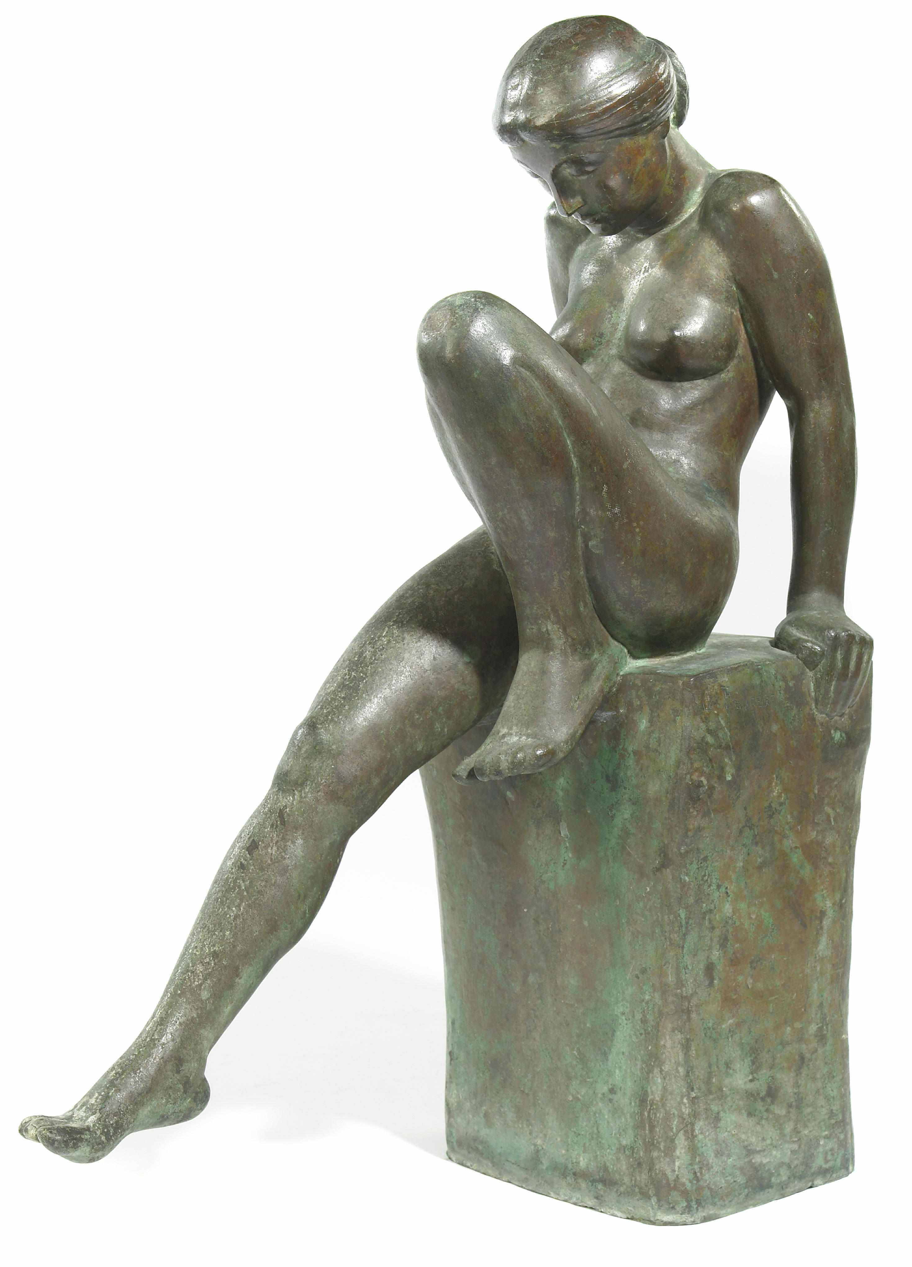 Appraisal: A patinated bronze sculpture of a female nude Baigneuse cast