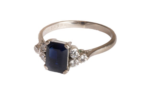 Appraisal: An ct white gold sapphire and diamond set ring claw