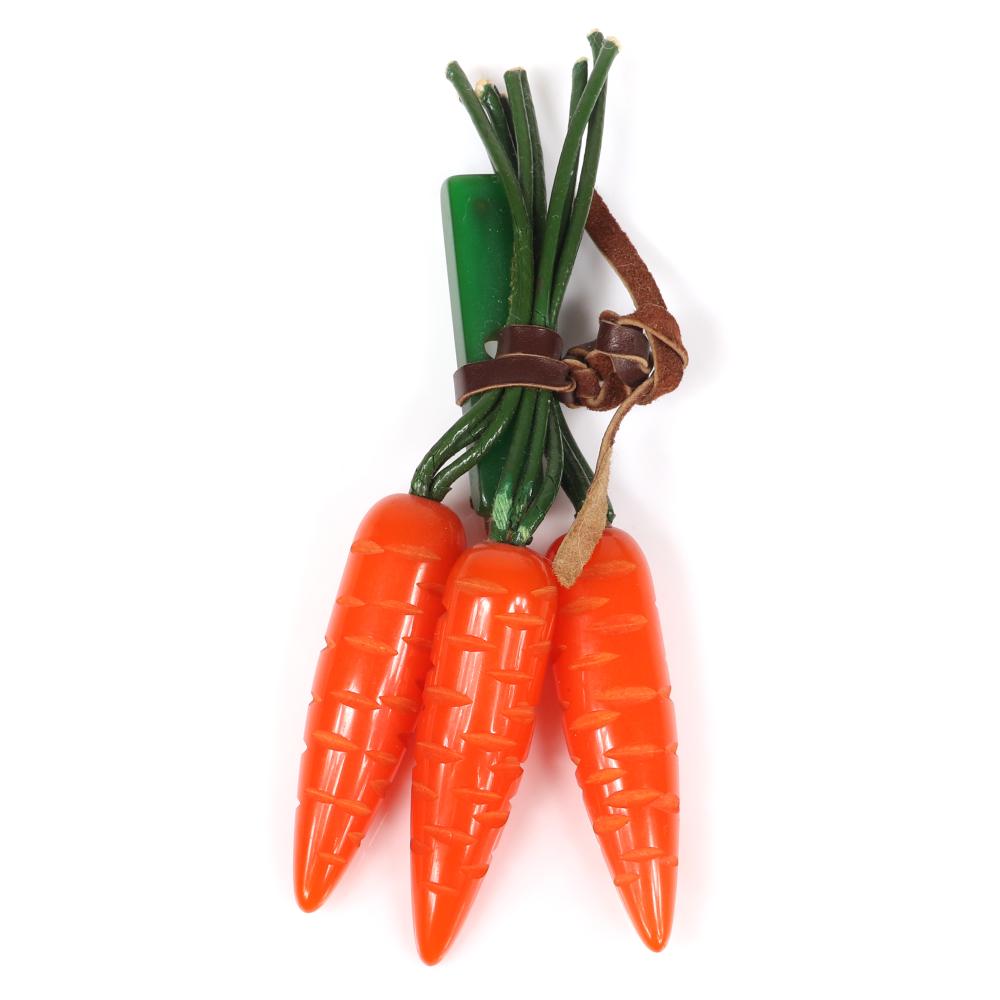 Appraisal: VINTAGE BAKELITE CARROT BUNCH DANGLE BROOCH WITH CARVED VEGETABLES WITH