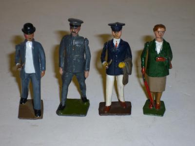 Appraisal: Four Britains metal character figures comprising two gentleman with pipes