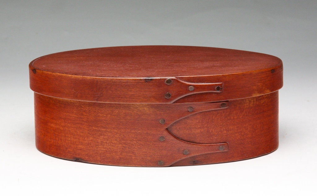 Appraisal: Second half th century Oval bentwood box with finger seams