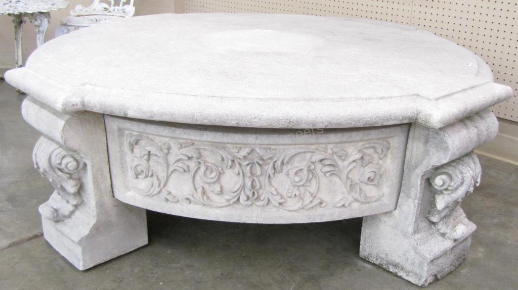 Appraisal: A cast concrete patio cocktail table Sebastiano from Artifacts International