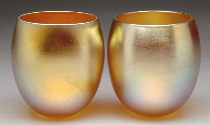 Appraisal: PAIR OF TIFFANY STUDIOS FAVRILE CUPS Unusual half egg form