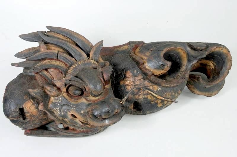 Appraisal: Asian Carved Wood Parcel Gilt Dragon Ornament Large Asian carved