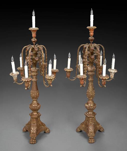 Appraisal: A pair of Italian Baroque style carved giltwood and tole