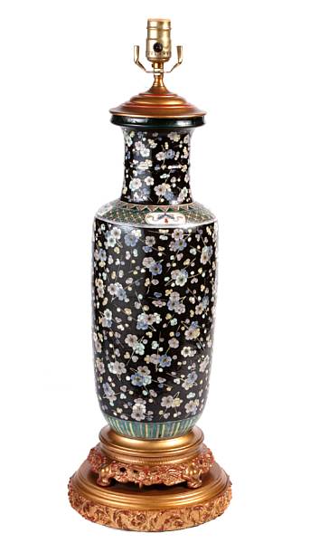 Appraisal: A Chinese famille noire and gilt bronze mounted vase of