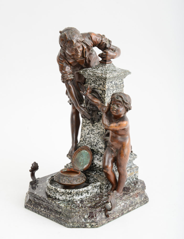 Appraisal: FRENCH MARBLE-MOUNTED BRONZE FIGURAL INKWELL Modeled as a boy and