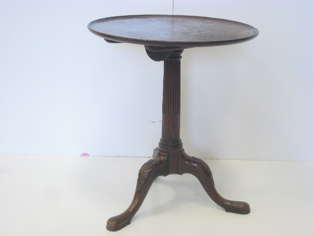 Appraisal: A Georgian mahogany Pillar Table with dished circular top on