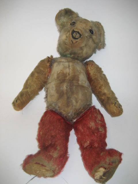 Appraisal: A Chad Valley three coloured Coronation bear c covered in