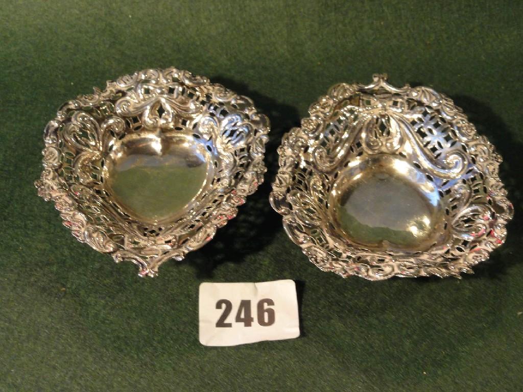 Appraisal: A pair of small silver bon bon dishes of heart