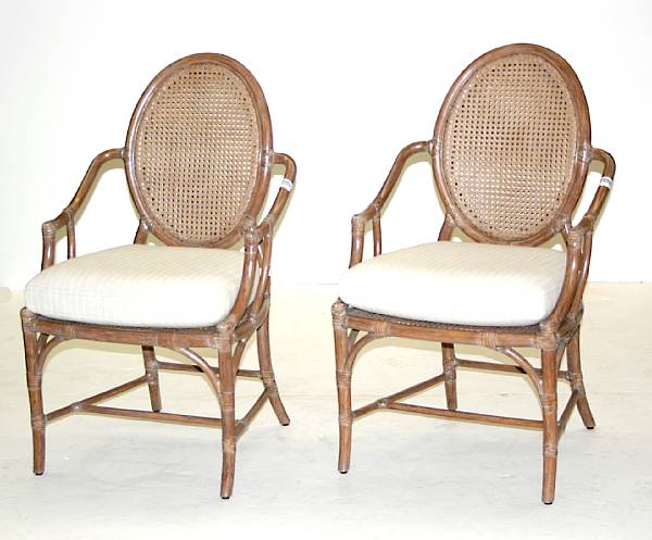 Appraisal: A set of four caned rattan armchairs McGuire Furniture Company