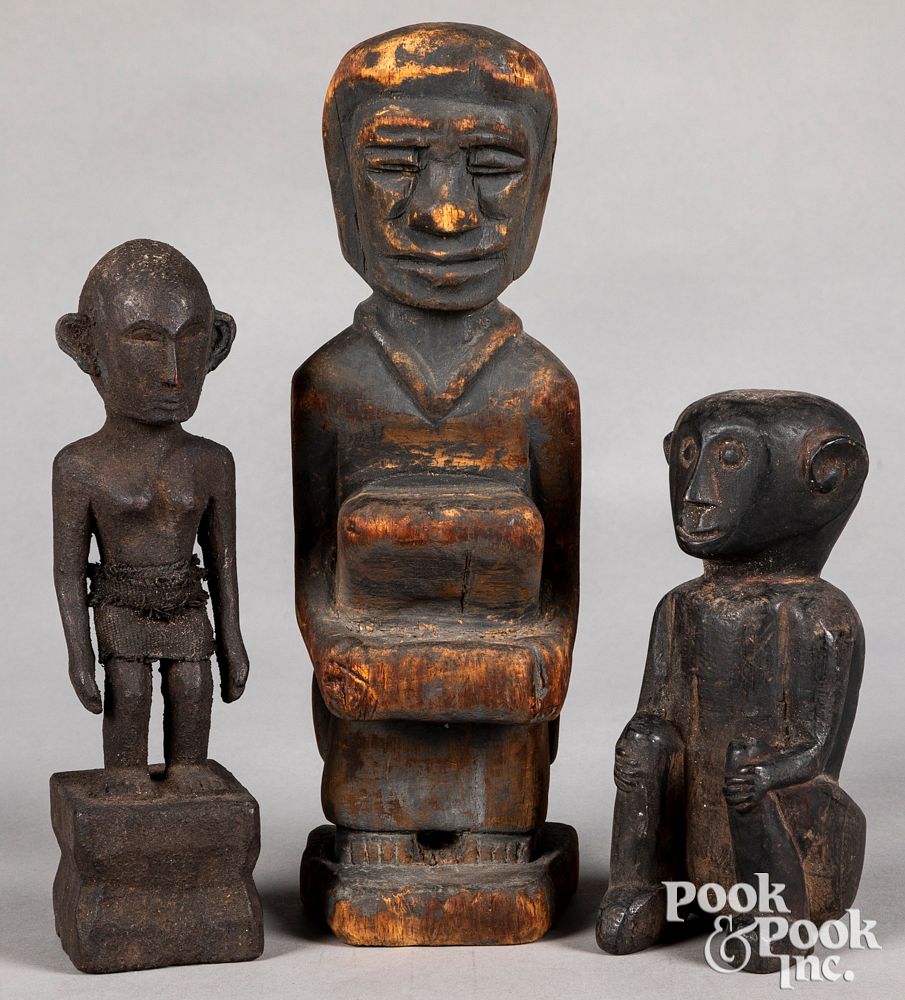 Appraisal: Three carved tribal statues Three carved tribal statues tallest -