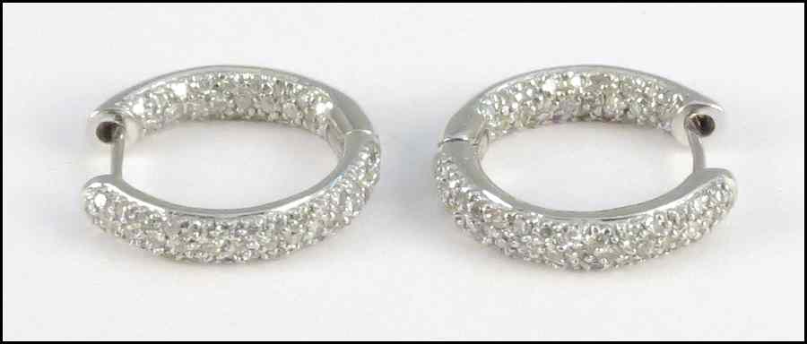 Appraisal: PAIR OF KARAT WHITE GOLD AND DIAMOND EARRINGS Diamonds H-I