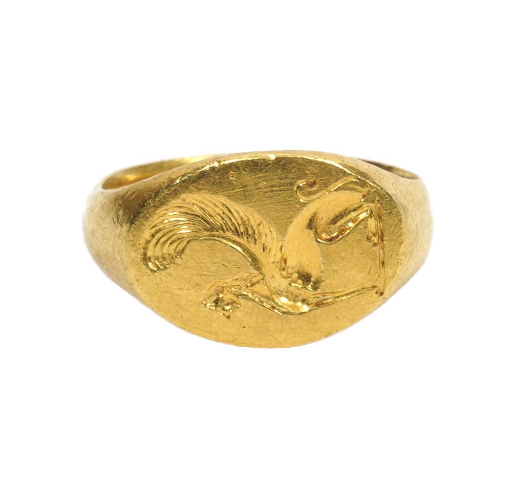 Appraisal: K YG SIGNET CREST GREEK SPHINX RING K yellow gold