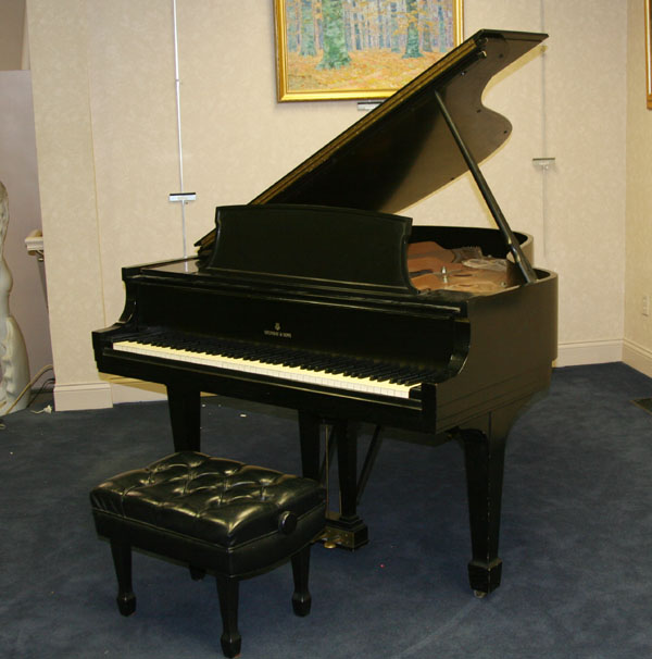 Appraisal: Baby grand piano Steinway L ebonized case with padded bench