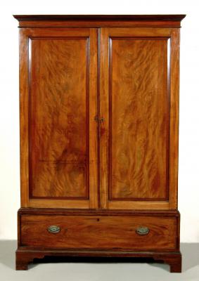 Appraisal: A MAHOGANY WARDROBE the moulded cornice over two doors with