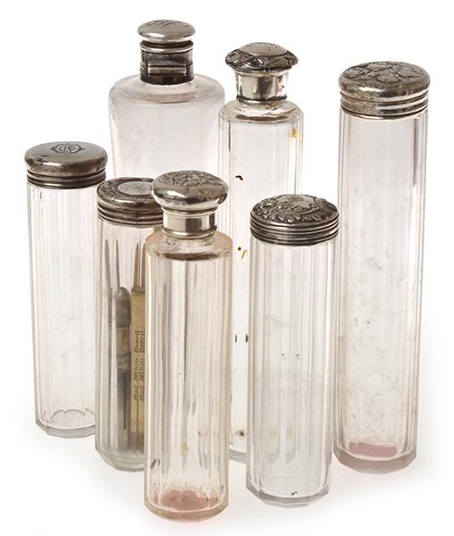 Appraisal: SEVEN STERLING SILVER CAPPED GLASS SCENT BOTTLES