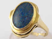 Appraisal: A yellow metal tests carat gold opal triplet ring opal