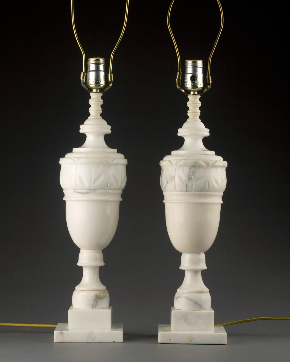 Appraisal: PAIR OF ITALIAN CARVED WHITE ALABASTER VASE Surrounded by a