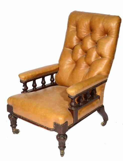 Appraisal: A GEORGE IV MAHOGANY ARMCHAIR upholstered in mustard coloured deep