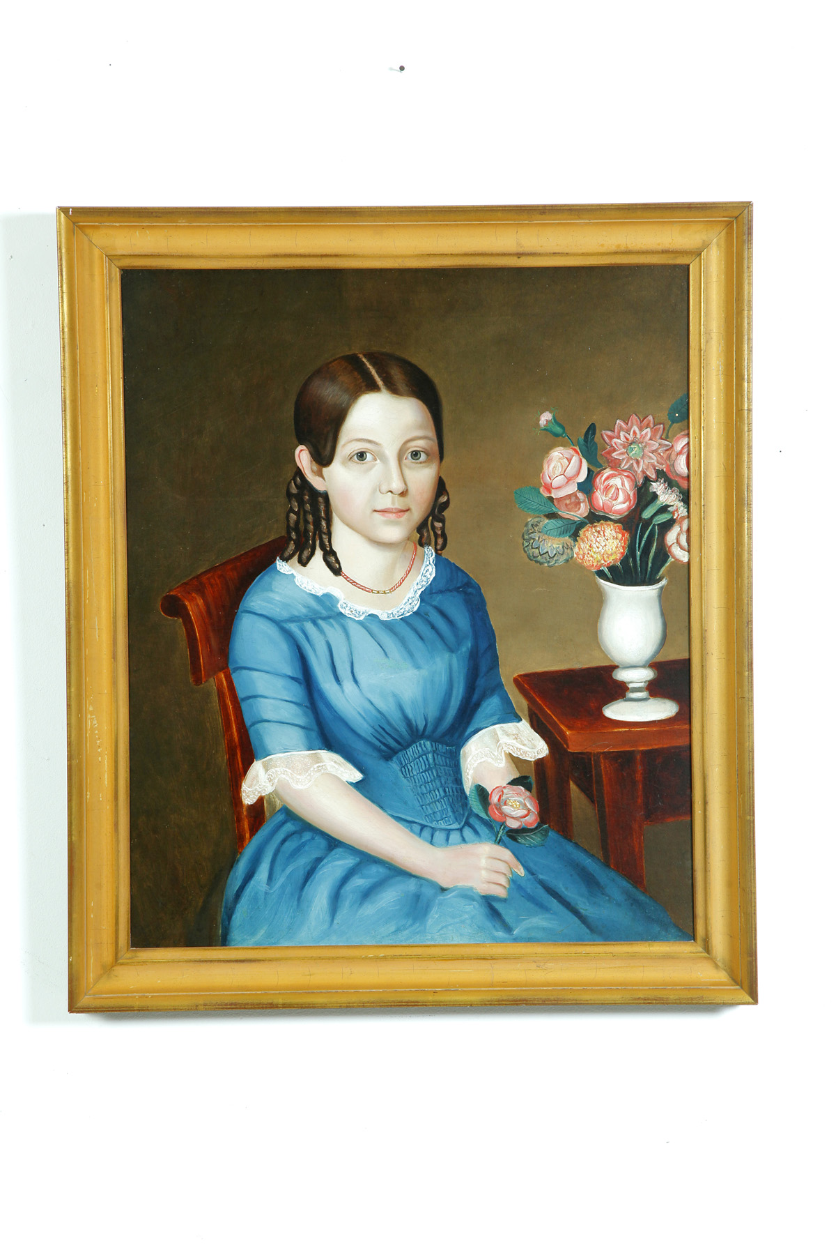 Appraisal: PORTRAIT OF A GIRL WITH FLOWERS AMERICAN SCHOOL ND QUARTER-