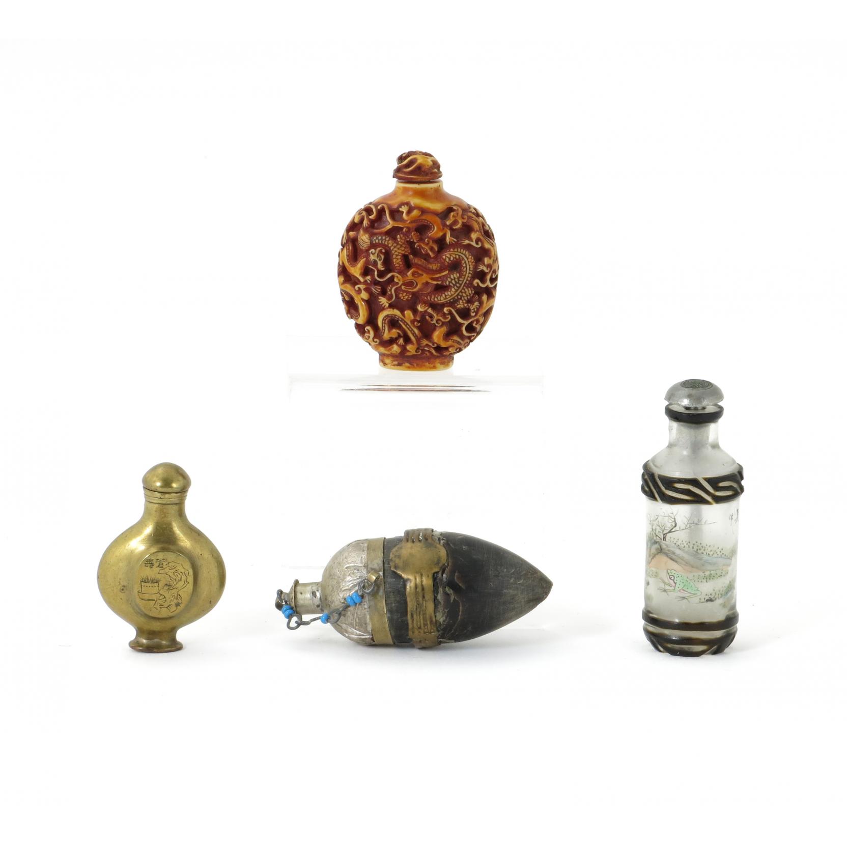 Appraisal: Four Chinese Snuff Bottles th century including a reverse painted