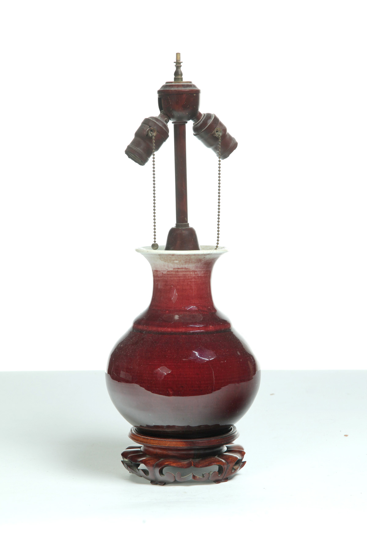 Appraisal: CHINESE SANG DE BOUEF GLAZE TABLE LAMP Twentieth century h