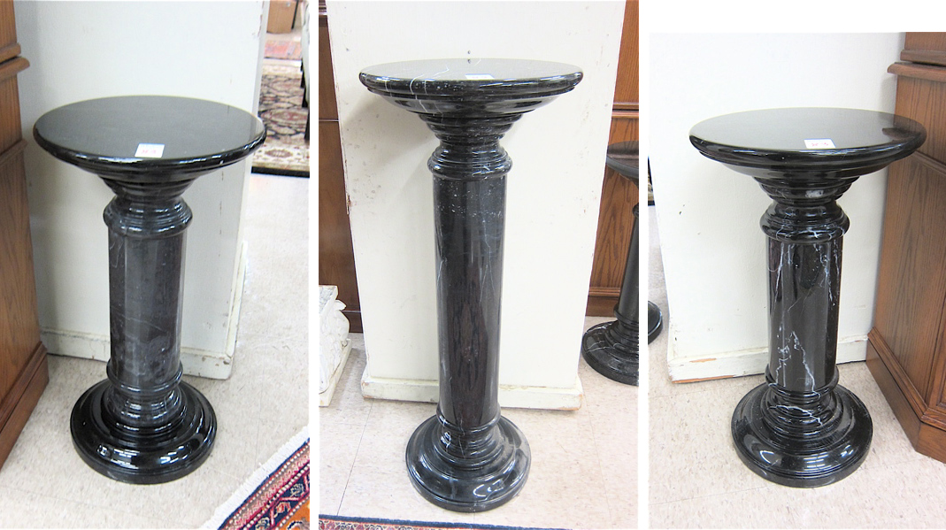 Appraisal: THREE BLACK ITALIAN MARQUINA MARBLE PEDESTALS a tall single and