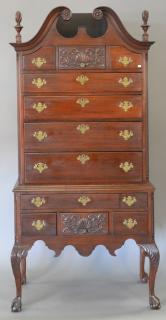 Appraisal: Chippendale style mahogany bonnet top highboy with shell and foliate