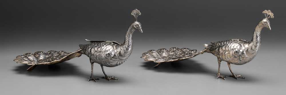 Appraisal: Pair German Silver Peafowl late th early th century table