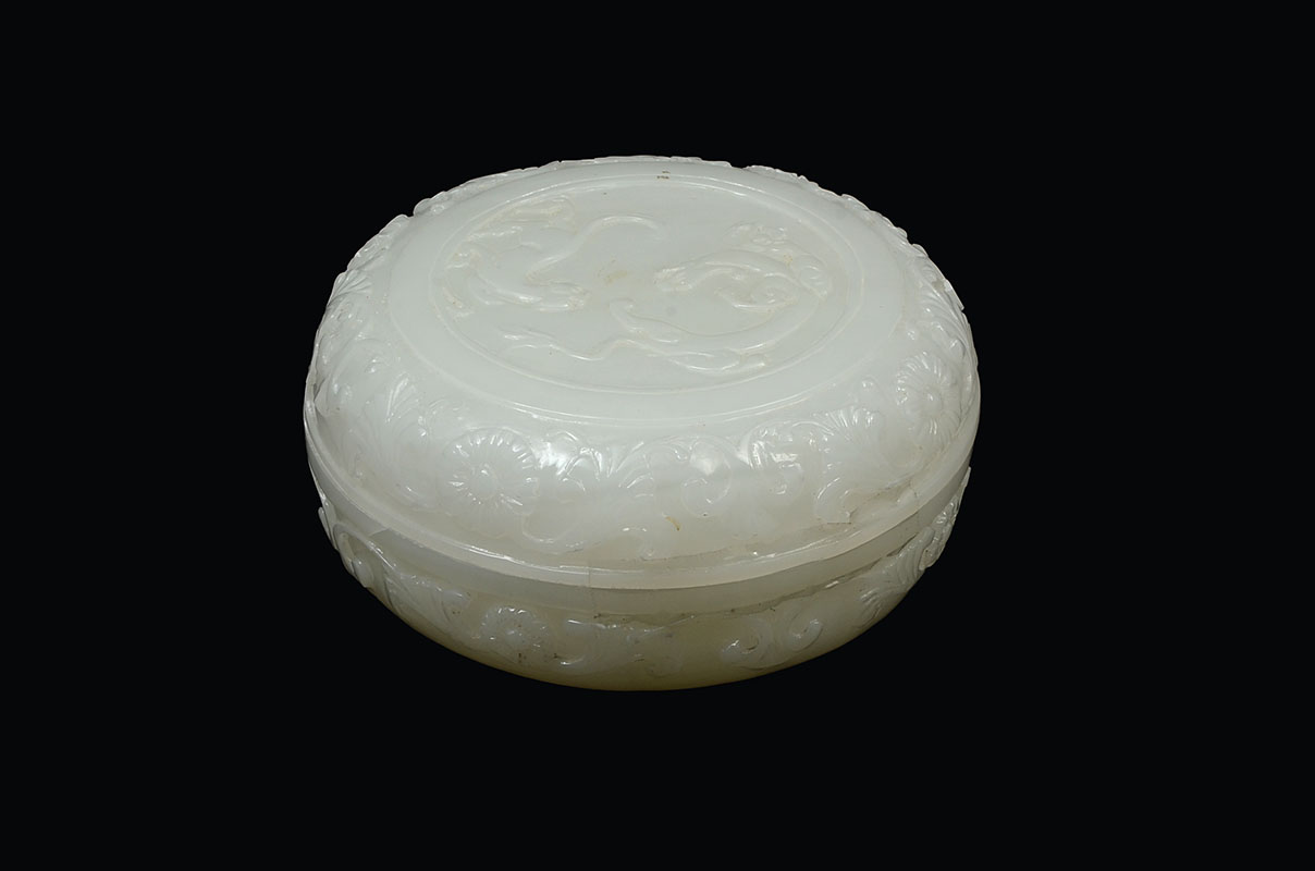 Appraisal: CHINESE CARVED WHITE JADE COVERED ROUND BOX Carved white jade