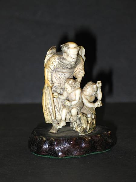 Appraisal: An ivory okimono of Shoki and two oni Meiji Period