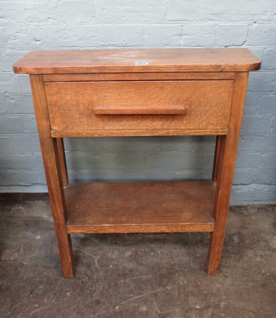 Appraisal: A 's oak two tier hall table with single frieze