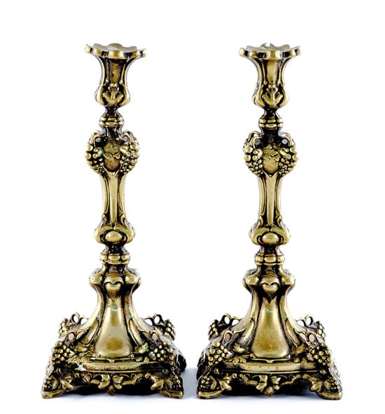 Appraisal: Pair Continental brass candlesticks ornate baluster form adorned with grapevine