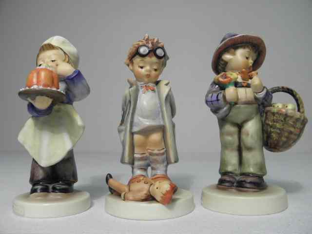 Appraisal: Three Hummel German porcelain figurines Includes ''Easter Greetings'' ''Doctor'' and