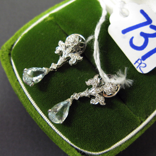 Appraisal: PAIR OF AQUAMARINE DIAMOND EIGHTEEN KARAT WHITE GOLD PENDANT EARRINGS