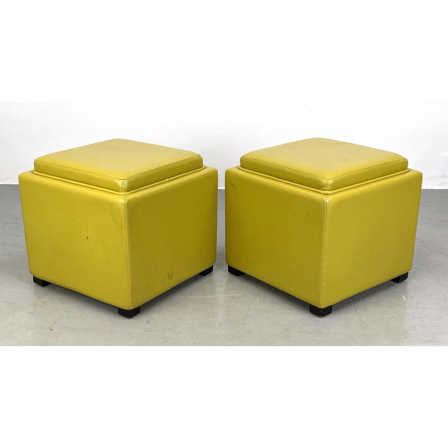 Appraisal: Pr Yellow Vinyl Storage Stools Ottoman Top is reversible from