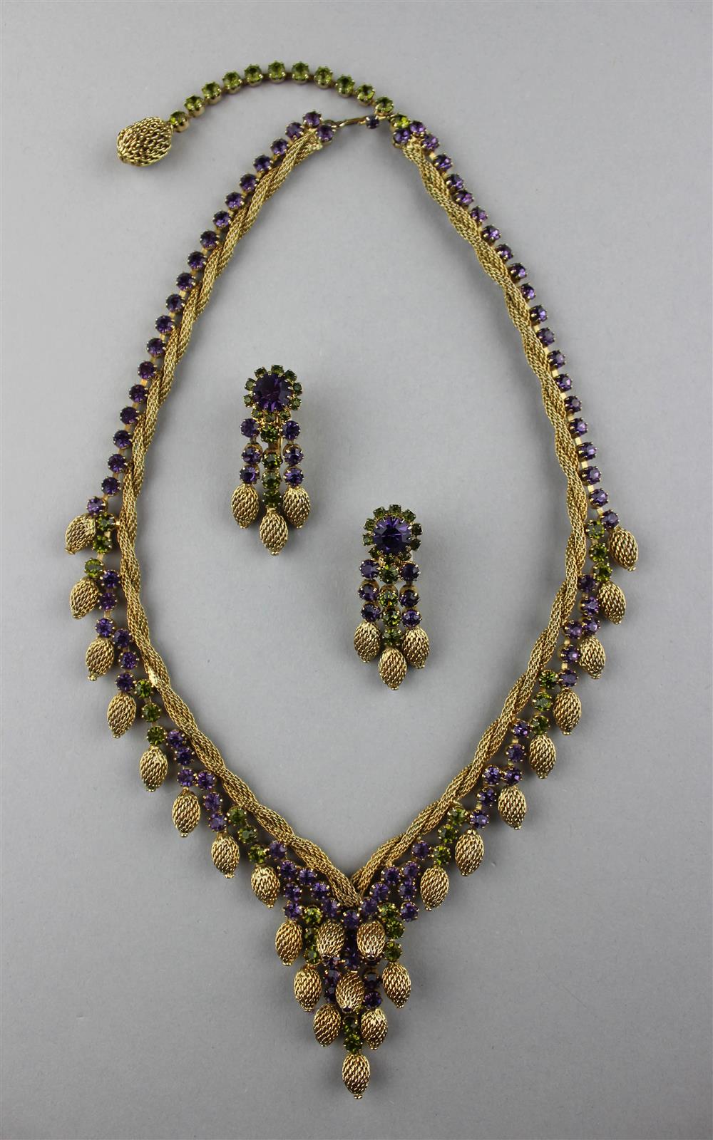 Appraisal: HOBE SEMI-PARURE Hobe goldtone necklace with amethyst and peridot colored