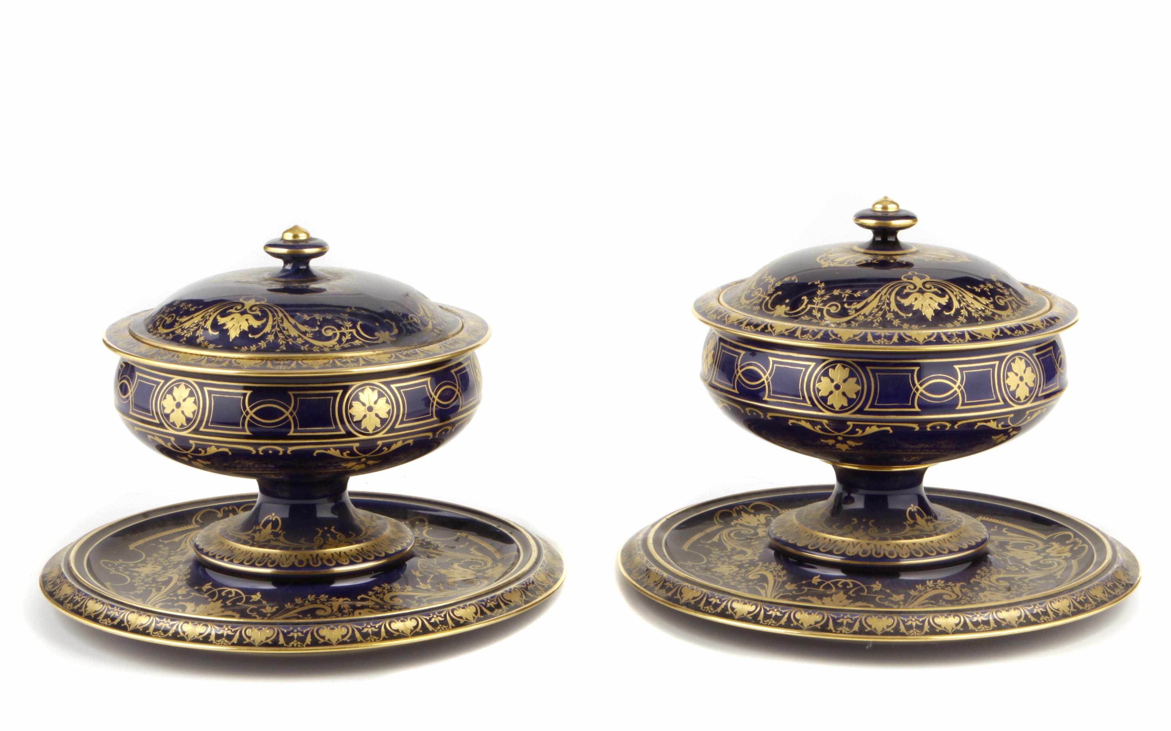 Appraisal: A pair of Svres gilt decorated cobalt ground covered bowls