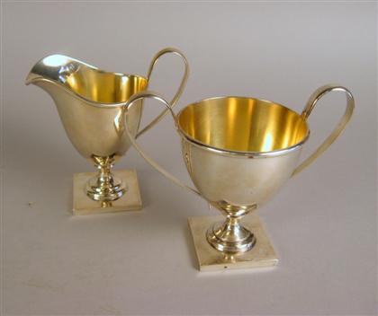 Appraisal: American sterling silver sugar bowl and creamer The bases stamped