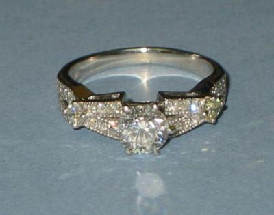 Appraisal: A SOLITAIRE DIAMOND RING the brilliant cut stone approximately cts