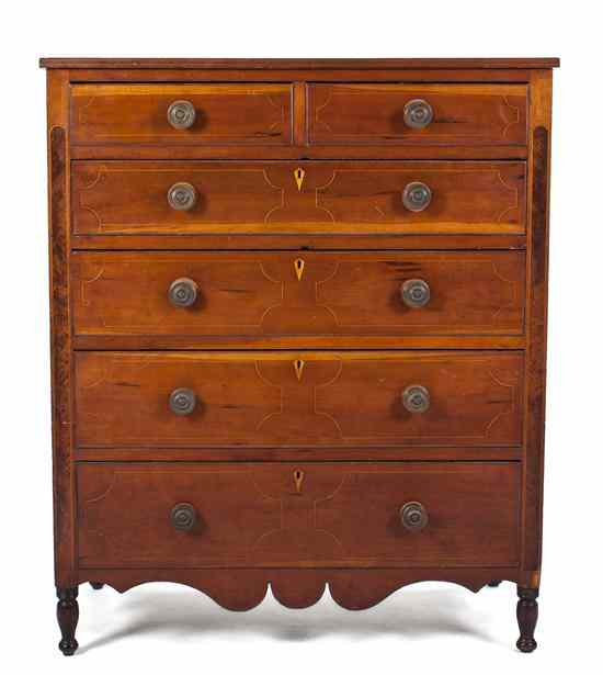 Appraisal: An American Maple Inlaid Chest of Drawers having two short