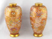 Appraisal: A pair of Japanese enamelled crysanthemum vases underglaze seal marks