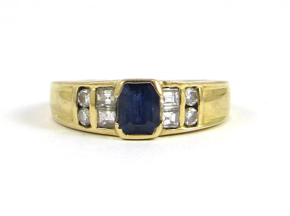 Appraisal: SAPPHIRE DIAMOND AND EIGHTEEN KARAT GOLD RING set with four