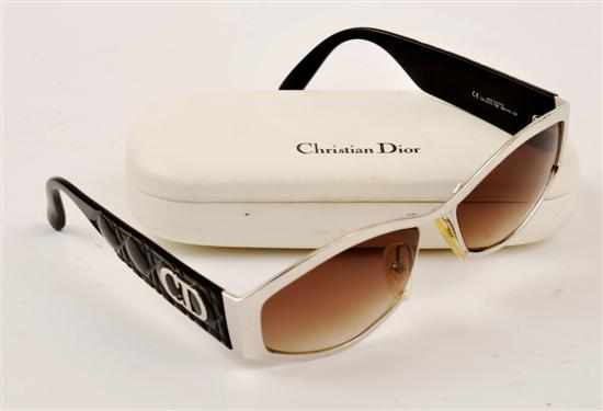 Appraisal: A PAIR OF SUNGLASSES BY CHRISTIAN DIOR The silver frames