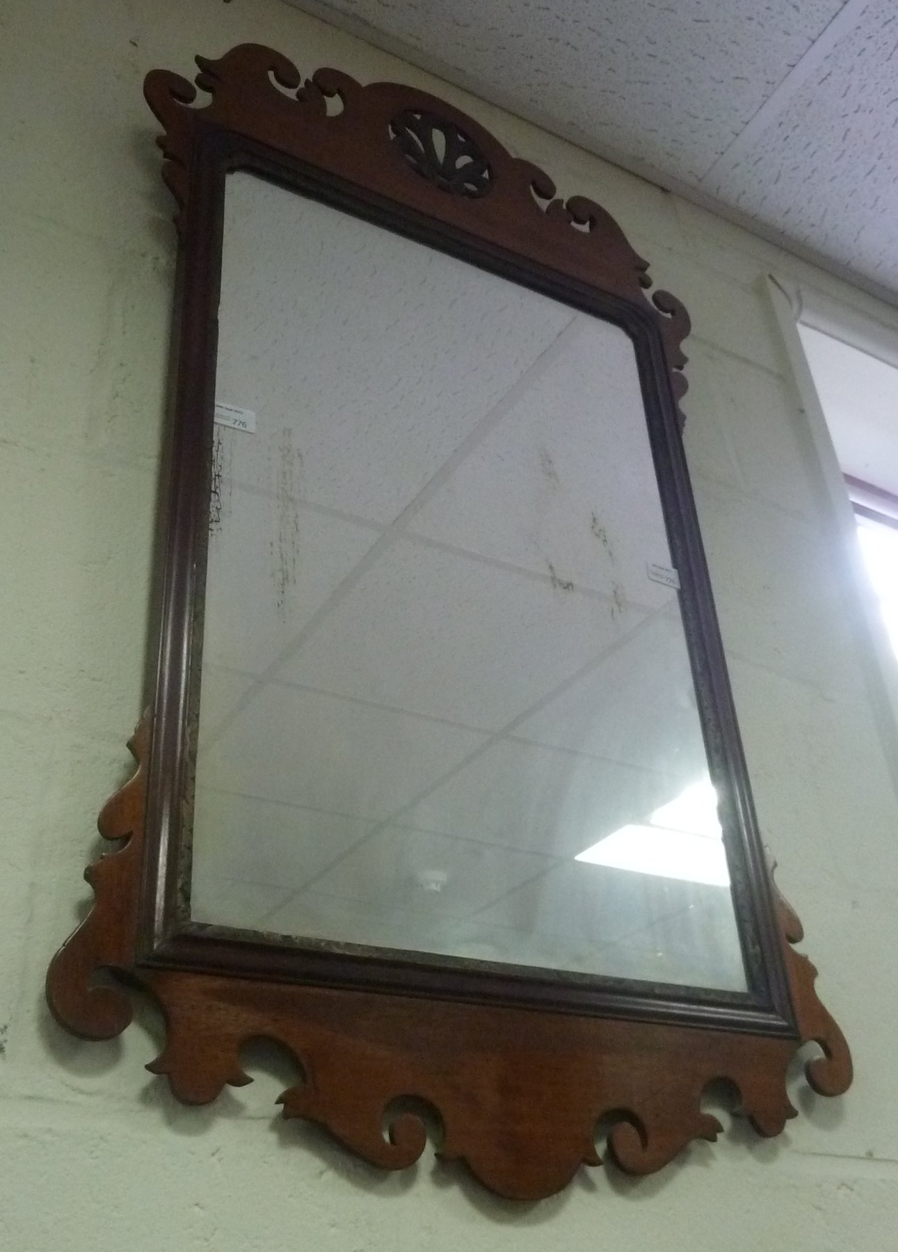 Appraisal: A mahogany wall mirror of th Century design with carved